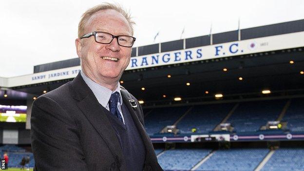 Alex McLeish arrives at Ibrox