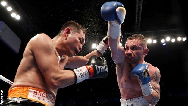 Carl Frampton attempts to land a right hand on the Filipino