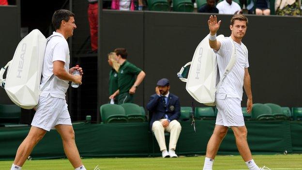 Ken and Neal Skupski celebrate reached the men's doubles quarter-finals