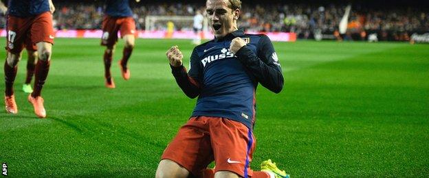 Antoine Greizmann of Atletico Madrid celebrates scoring against Valencia