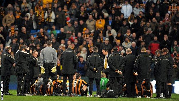 Phil Brown delivers his half-time team talk on the pitch