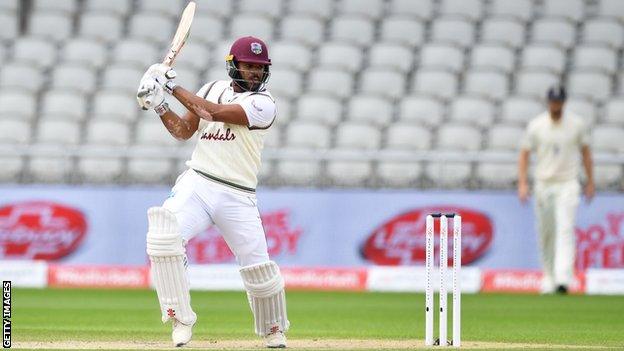 West Indies batter John Campbell plays a shot in a Test against England