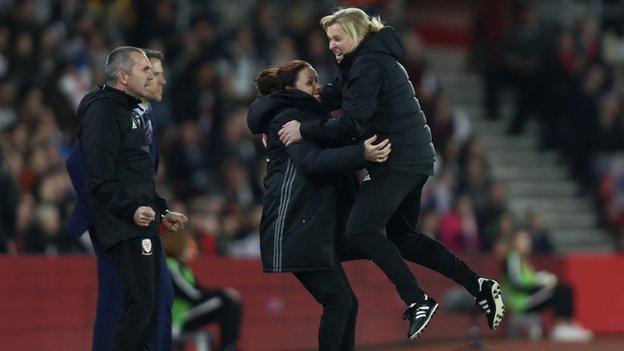 Jayne Ludlow celebrates Wales' World Cup qualifying draw against England at Southampton's St Mary's Stadium in 2018