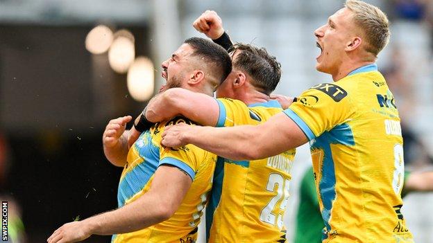 James Bentley celebrates his try