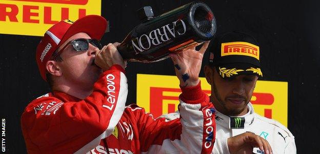 Kimi Raikkonen and Lewis Hamilton on the podium at the United States Grand Prix