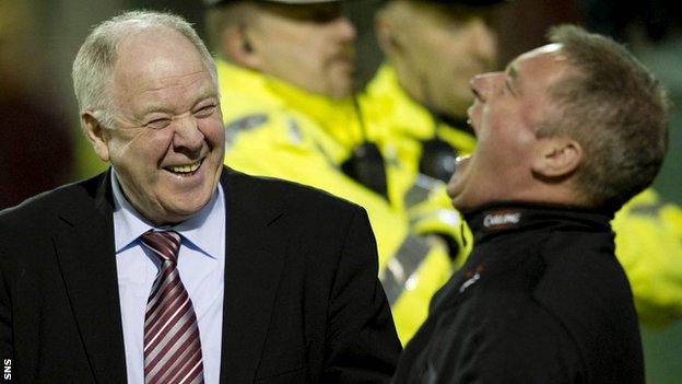 Craig Brown and Ally McCoist share a joke in 2010, when Brown was Motherwell boss and McCoist an assistant at Rangers