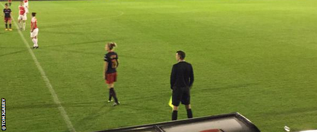 Assistant referee Michael Oliver running the line at Boreham Wood FC