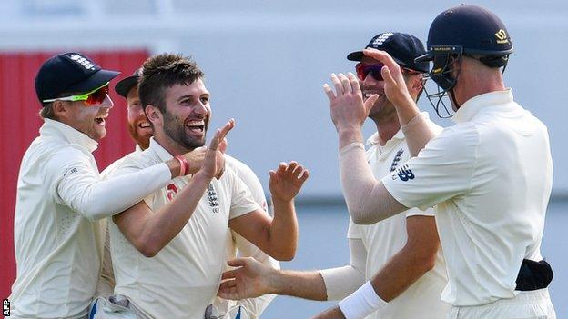 Mark Wood celebrates a wicket