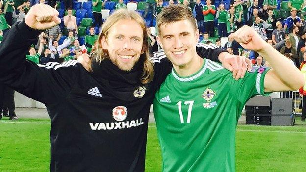 Austin Macphee celebrates with Northern Ireland's Paddy McNair