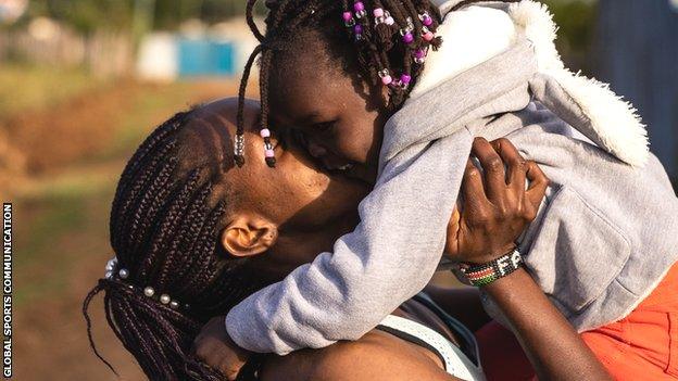 Faith Kipyegon and her daughter Alyn