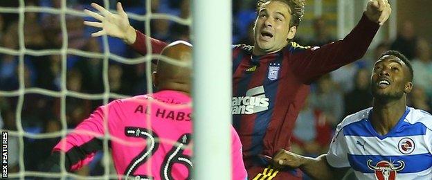 Brett Pitman fouled by Tyler Blackett