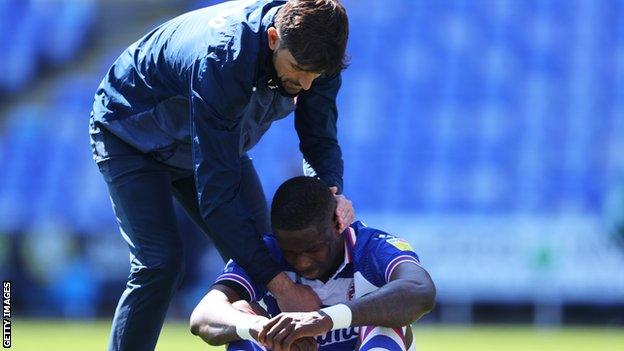 Reading manager Veljko Paunovic consoles striker Lucas Joao after their draw against Swansea City