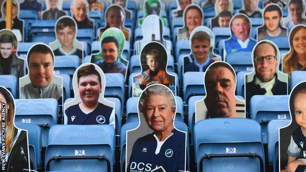 Cardboard cut-out of the Queen