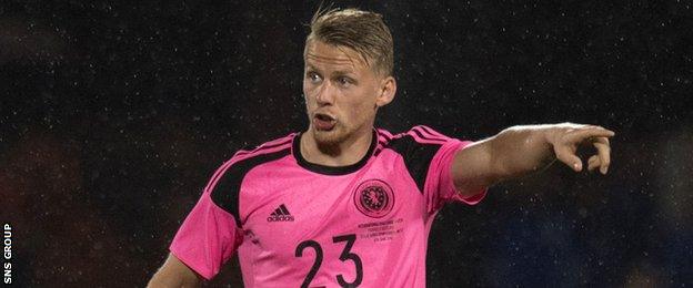 Swansea City left-back Stephen Kingsley made his Scotland debut against France