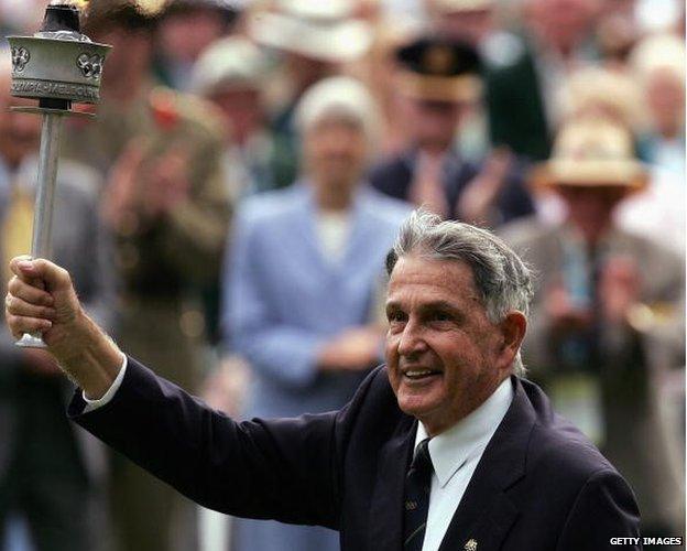 Ron Clarke walks around the MCG holding the Olympic torch during the 50th anniversary of the 1956 Melbourne Olympic Games at the Melbourne Cricket Ground November 19, 2006 in Melbourne, Australia.