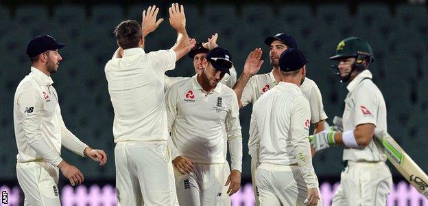 Craig Overton celebrates a wicket