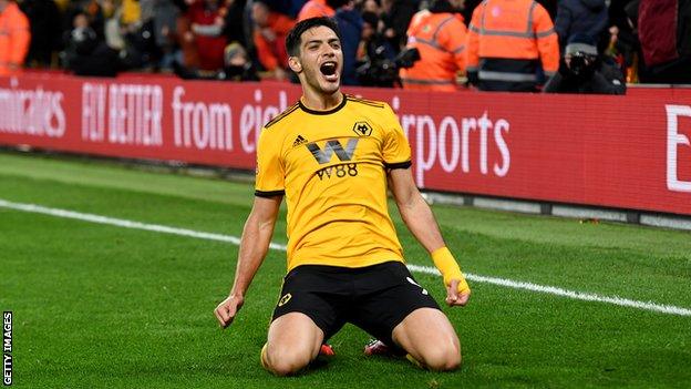 Wolves striker Raul Jimenez slides on his knees in celebration after scoring his side's opener against Manchester United