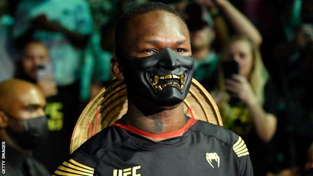 Israel Adesanya dressed up as Mortal Kombat fighter Raiden