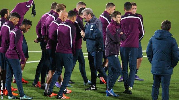 England boss Roy Hodgson with his players