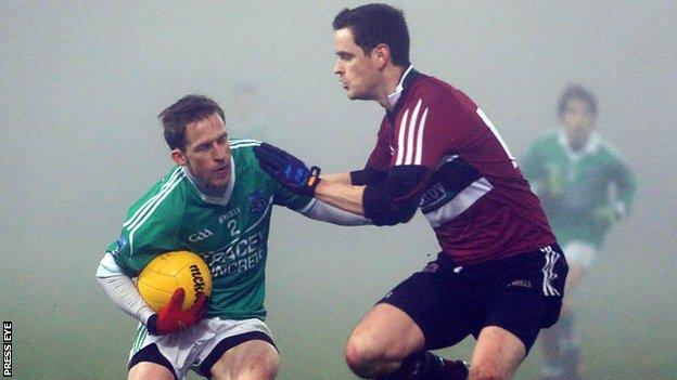 Fermanagh's Johnny Woods battles with St Mary's Brendan Hasson in the 2014 McKenna Cup game