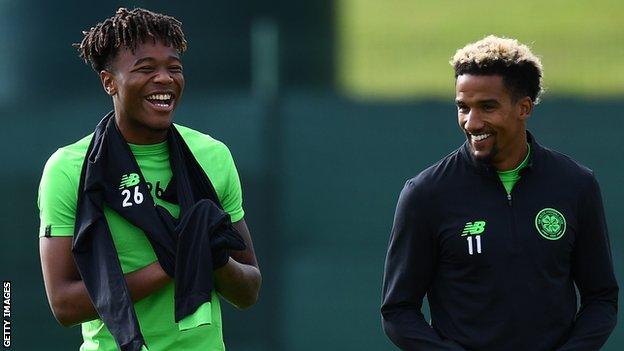 Kundai Benyu chats to Celtic team-mate Scott Sinclair