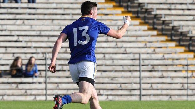 A delighted Robbie Smyth runs away in celebration after scoring Longford's second goal against Monaghan