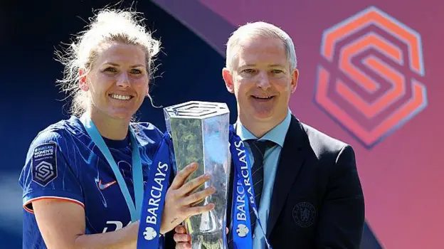 Paul Green alongside Chelsea captain Millie Bright 