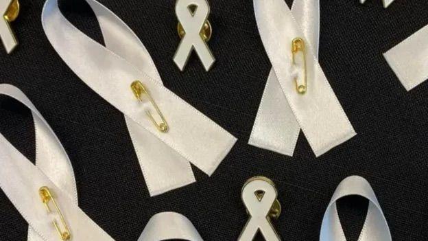 White ribbons.