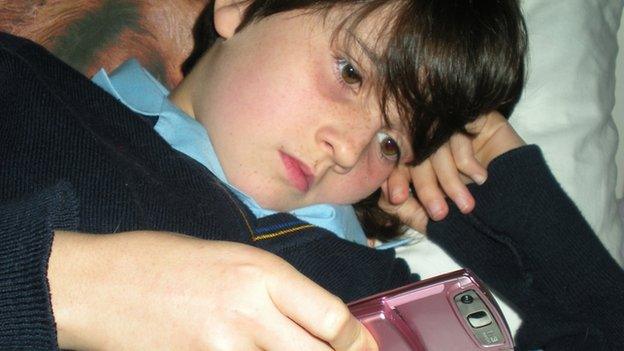 Girl looking at mobile phone