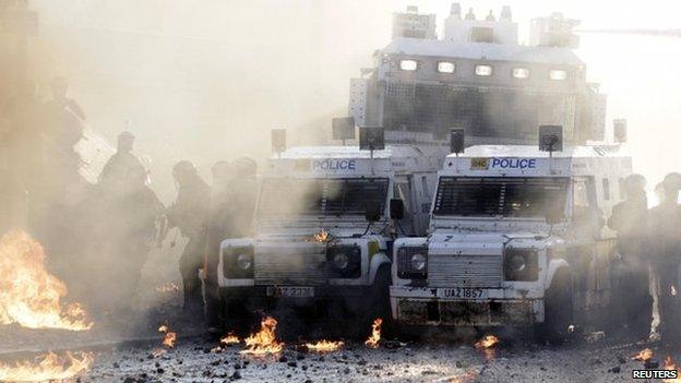 Police come under attack with petrol bombs thrown by Nationalist youths in the Ardoyne area of north Belfast