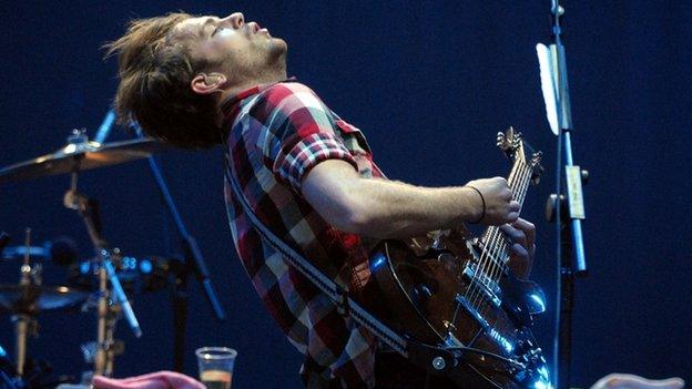 The Kings of Leon on stage at Reading Festival