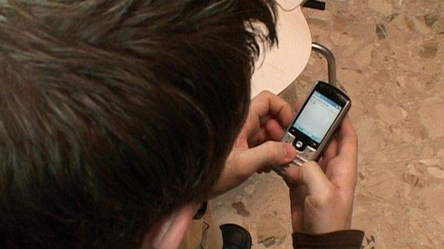 Boy using phone