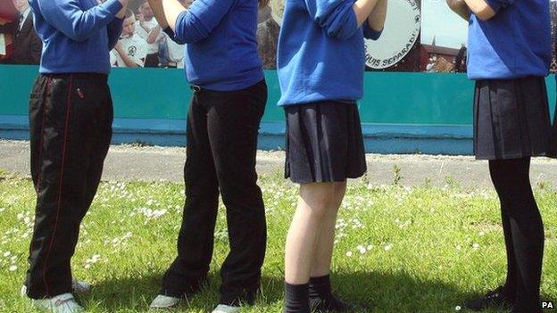 Children in school uniforms