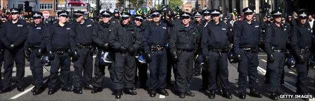 Police officers block a road