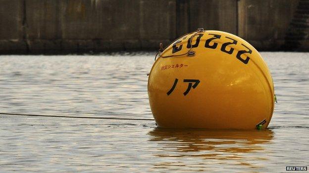 Yellow flotation pod in the water