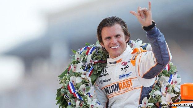 Dan Wheldon celebrating winning the Indy 500