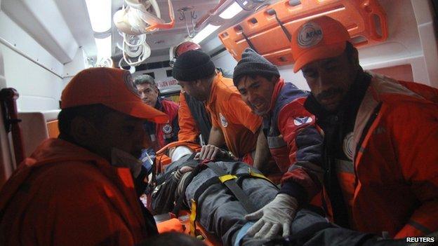 Rescuers with Ferhat Tokay