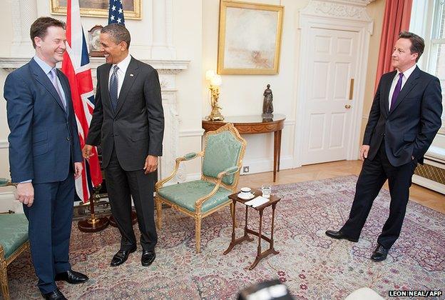 US President Barack Obama (centre) meets Britain's Prime Minister David Cameron (right) and Deputy Prime Minister, Nick Clegg, inside 10 Downing Street