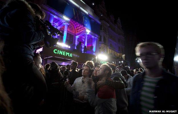 Films fans wait to catch a glimpse of the stars at the London premier of W.E.