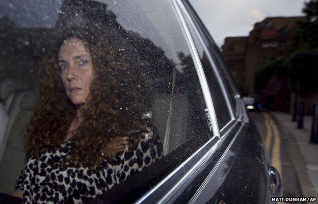 Rebekah Brooks, the then chief executive of News International is driven away from the offices of the company in Wapping, London, after it was announced the News of the World newspaper would be shut down, 7 July 2011