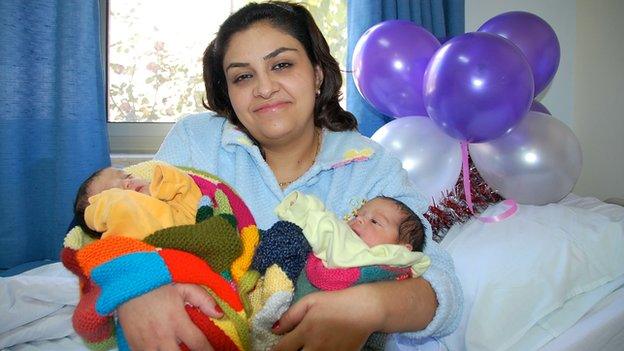 Roula Bandaq with twin girls