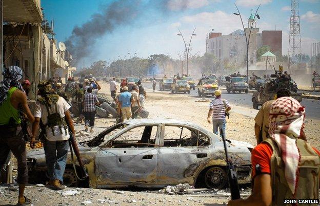 Rebel gun trucks in Sirte, Libya, in September 2011 - photo by John Cantlie