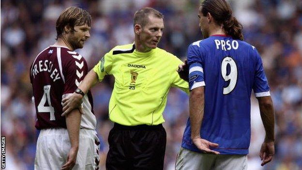 Referee Kenny Clark taking charge at a Scottish game between Rangers and Hearts