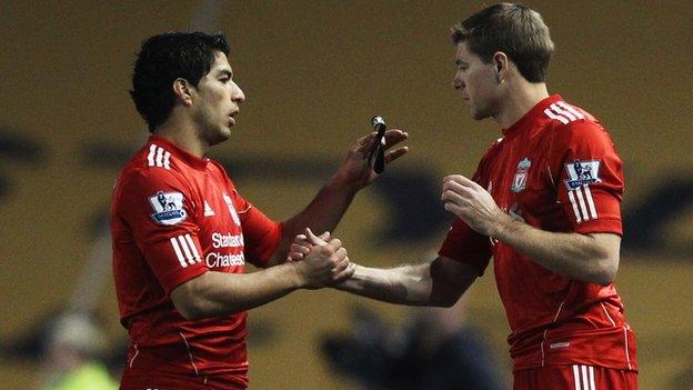 Luis Suarez (left) has not played for Liverpool since Boxing Day