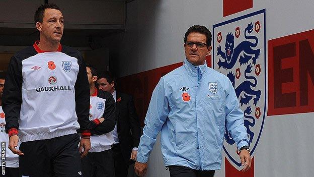 England's John Terry and Fabio Capello