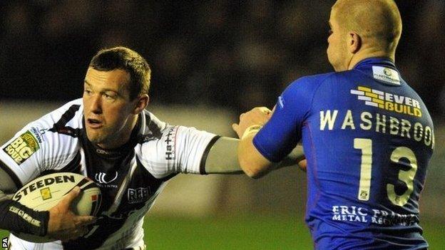 Widnes forward Steve Pickersgill holds off Wakefield Wildcats' Danny Washbrook