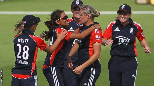 Katherine Brunt (second right) is congratulated after taking a wicket