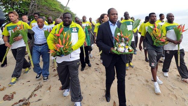 Zambian players and officials visit the site close to the crash in Libreville