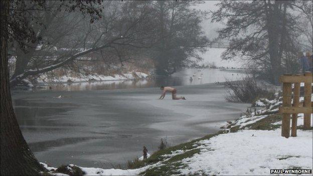 The man crawling across the river