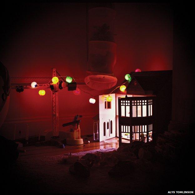 A dolls house by Alys Tomlinson